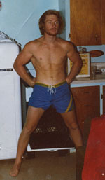 Me when I was younger in a cabin warming up.